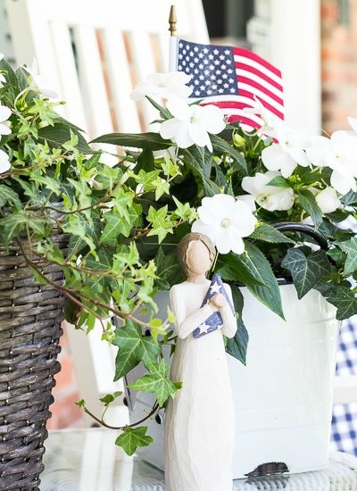 white impatiens in pots on table patriotic porch fi