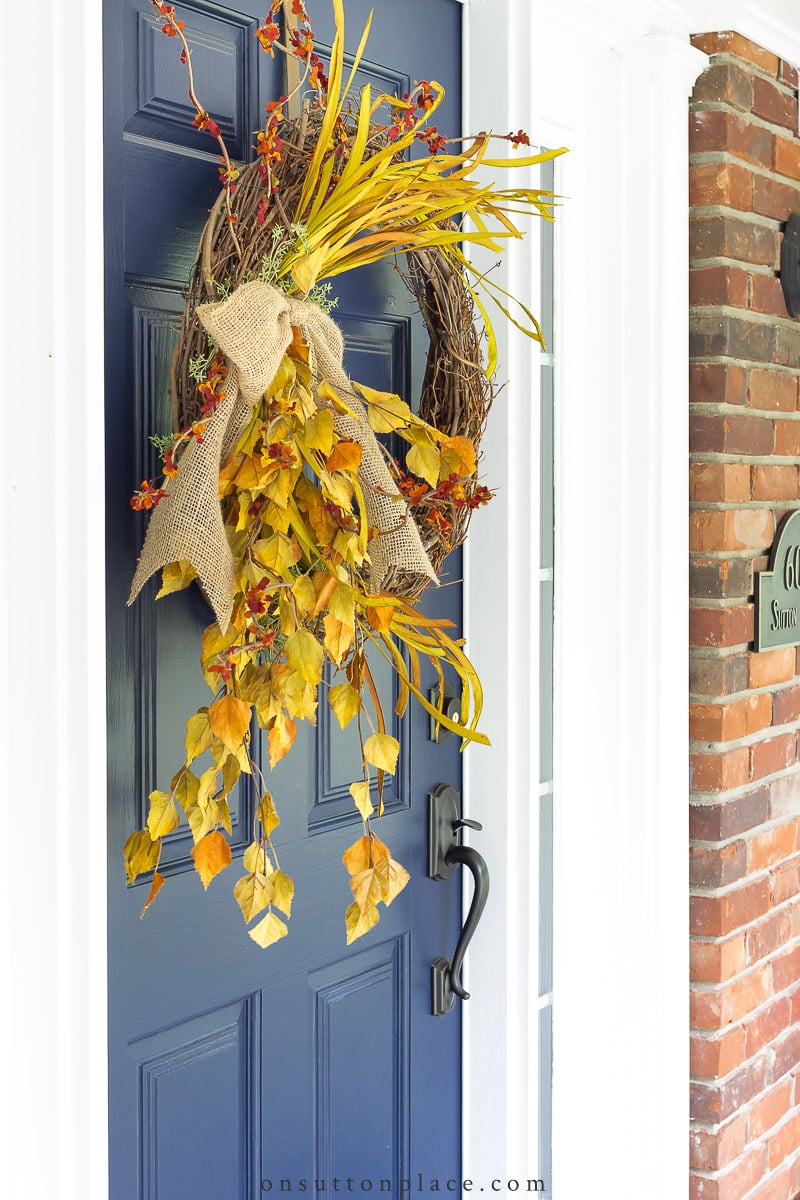 2022 fall wreath on blue front door
