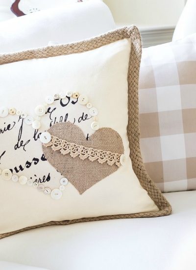 valentine's heart pillow on sofa fi