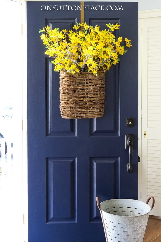 Spring Forsythia Door Basket | Make this in just a few minutes. It's a show stopper from the street and totally DIY!