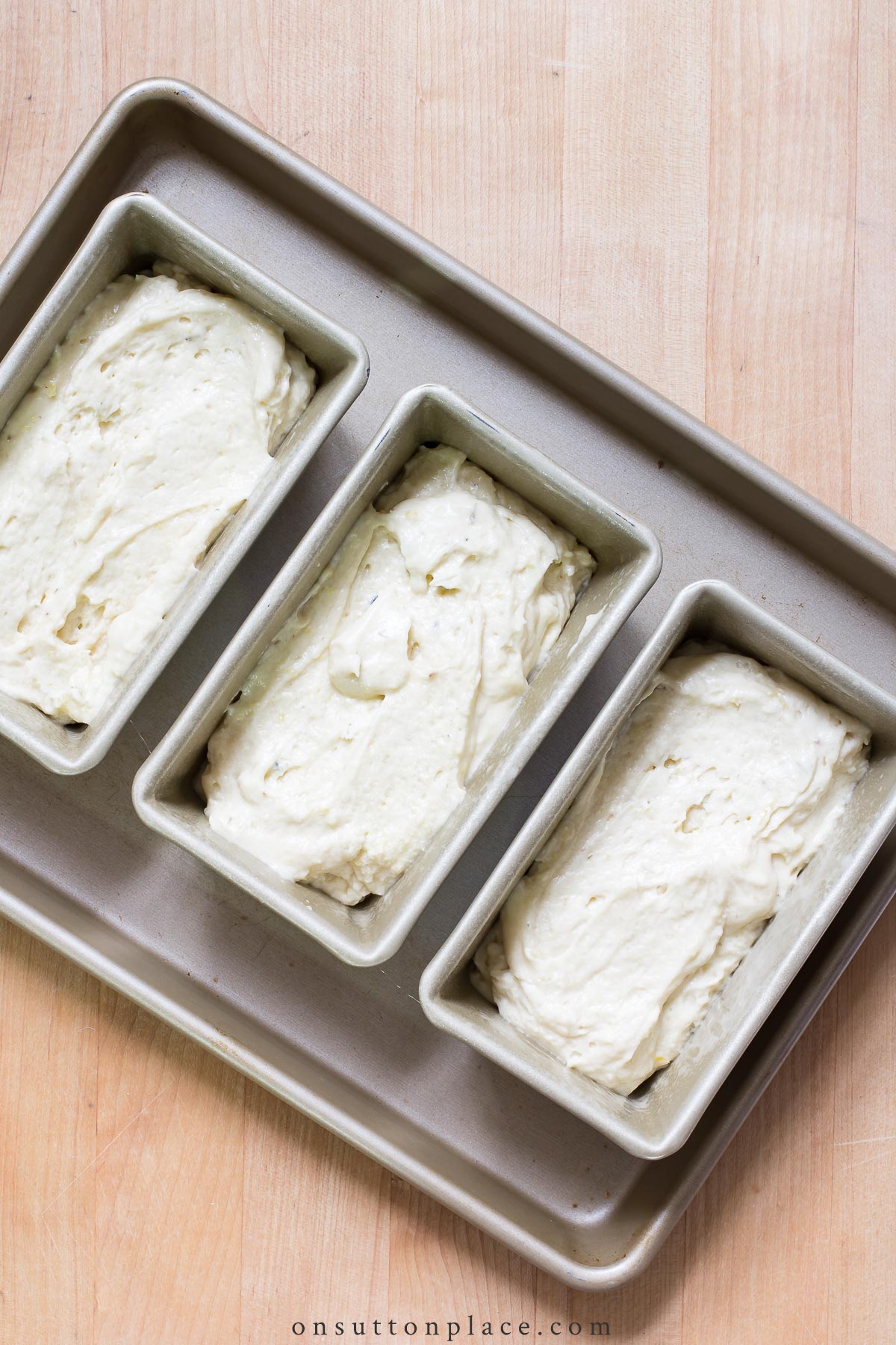 lavender lemon bread batter in pans 2022