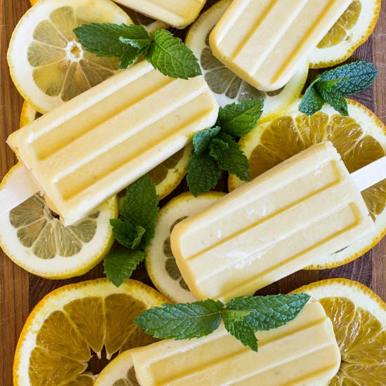 citrus banana cream popsicles fi Citrus Banana Cream Popsicles | Fresh and tasty summer treat that your kids will love! Easy enough that the kids can help.