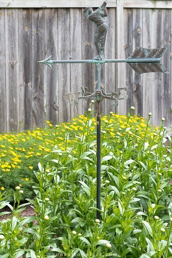Easy garden art ideas that show you how to add your own personal style to your garden through garden art. Budget friendly options included! golfer weathervane in garden 2021