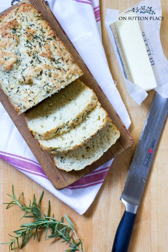 This Savory Rosemary Buttermilk Quick Bread Recipe is the perfect addition to any meal. Simple to make, moist and flavorful quick bread with cheese.