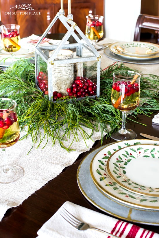 Christmas Tablescape Ideas | Rustic Meets Refined: How to combine elegant china and crystal with rustic Christmas farmhouse elements.