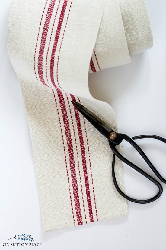 DIY Antique Grain Sack Ribbon Tutorial | Make your own ribbon from an antique grain sack. Easy, no-sew, step-by-step directions.
