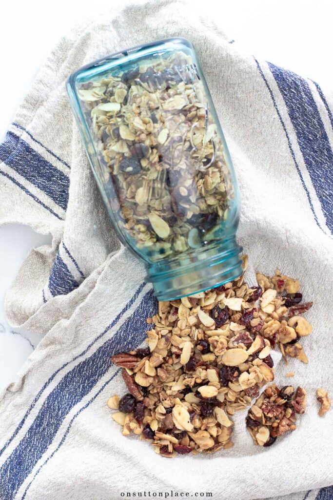 homemade granola recipe spilling out of vintage mason jar