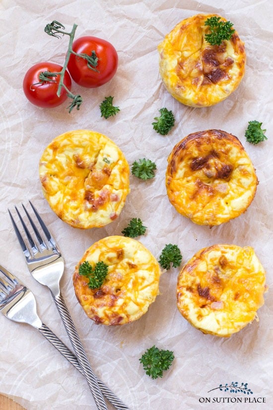 Easy brunch idea! Breakfast Egg Muffins with Ham & Cheese. This make-ahead main dish is perfect for Easter or any family gathering. Can also be made in a 9 x 13 pan.