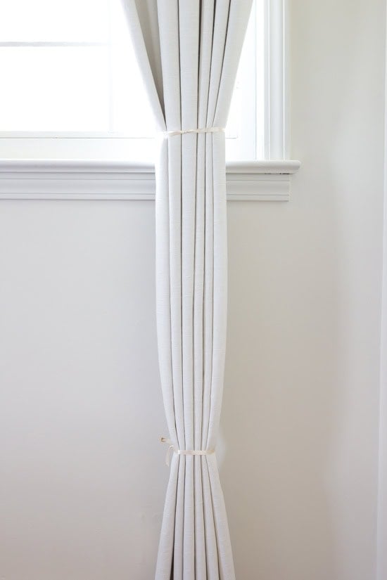 how to hang curtains make pleats tied with ribbon