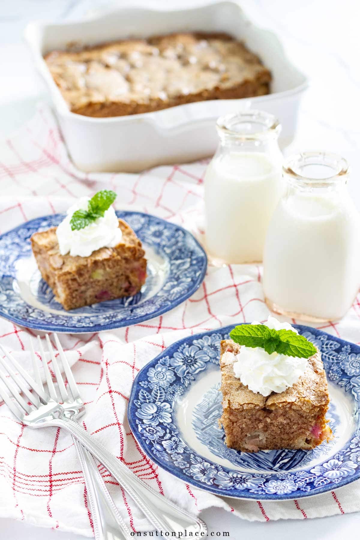 pieces of rhubarb cake on blue plates