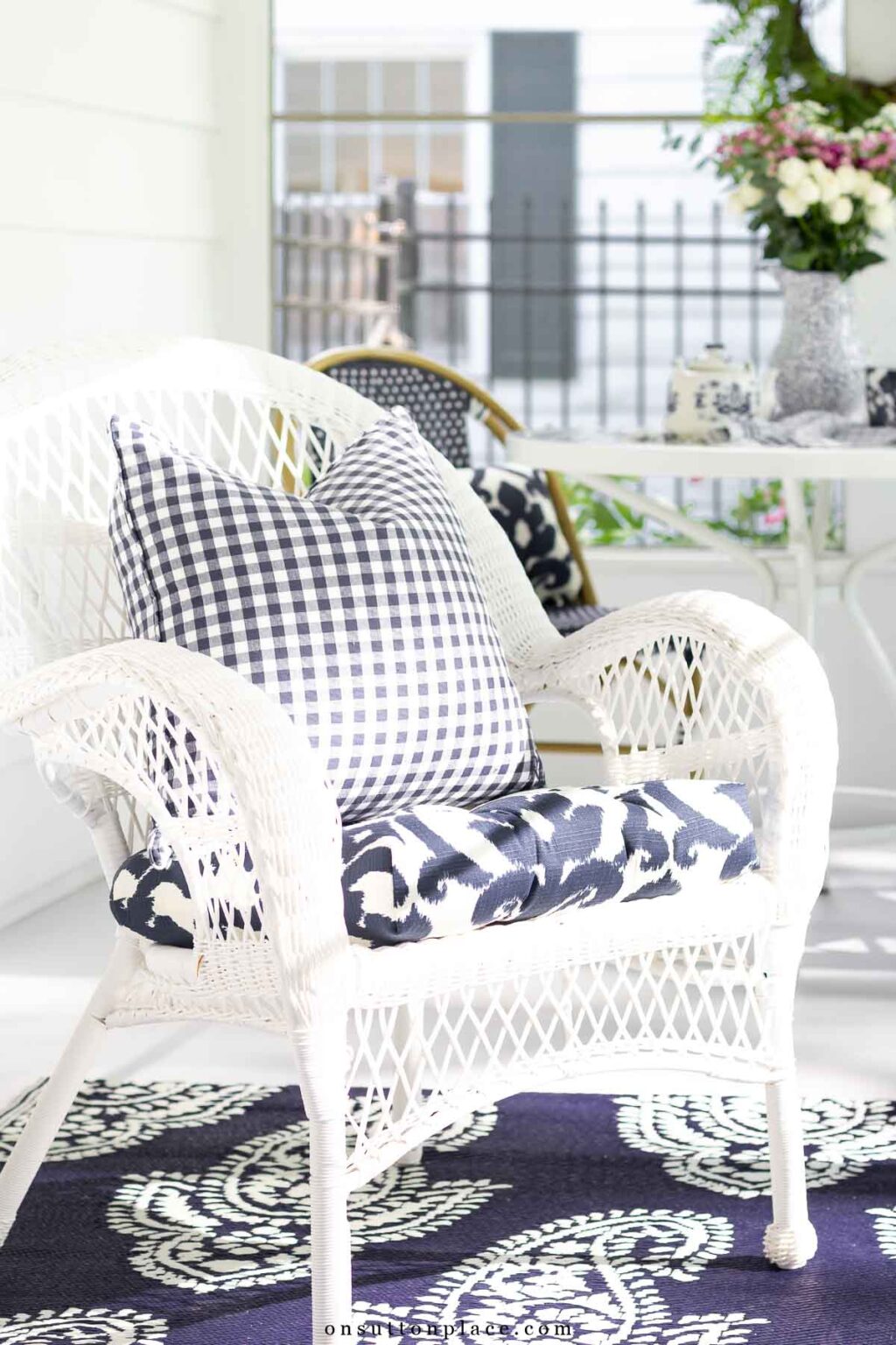 Small Screened In Porch Ideas: A Cozy Blue and White Back Porch