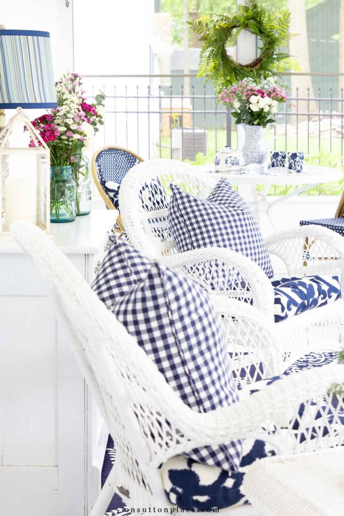 small screened in porch ideas with blue and white decor
