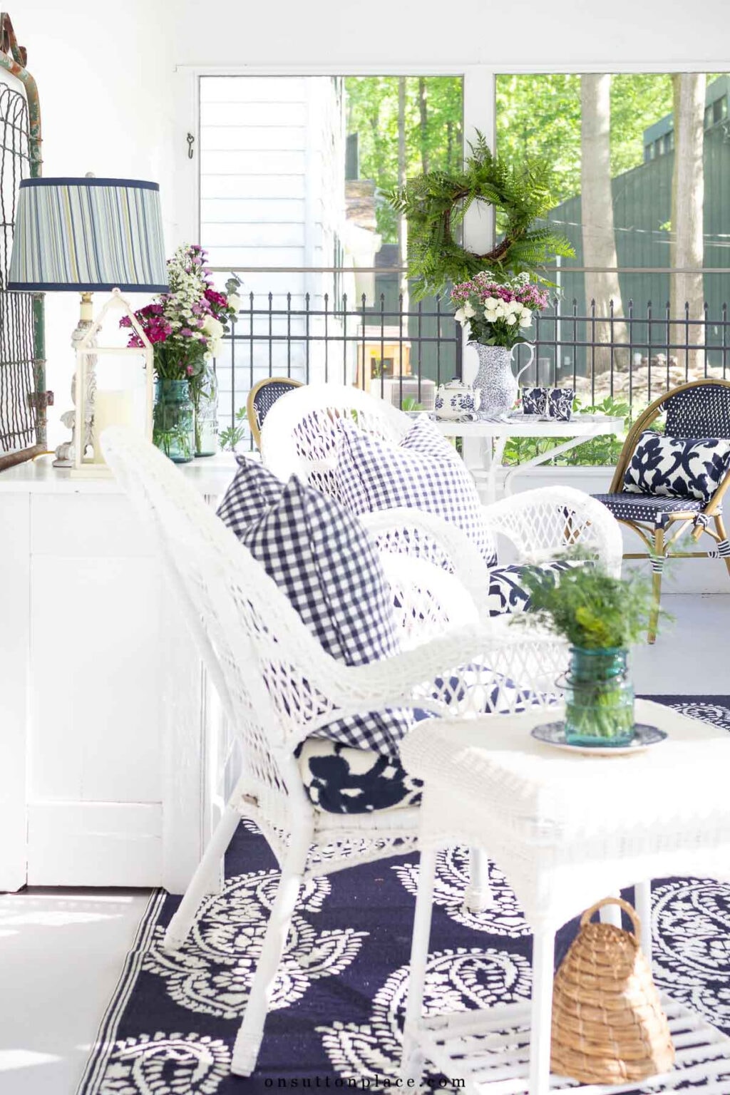 Small Screened In Porch Ideas: A Cozy Blue and White Back Porch