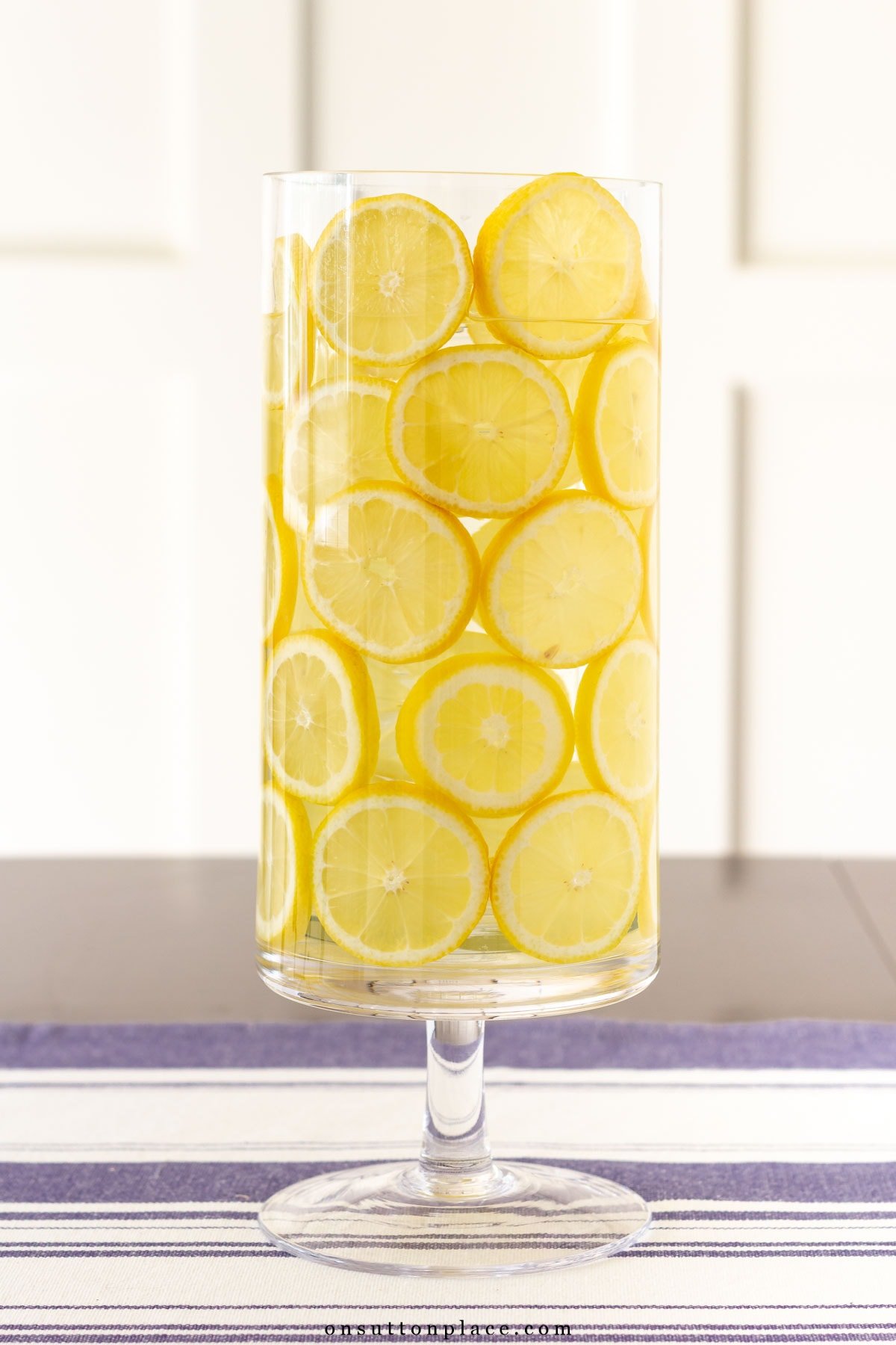 assembly step for flower arrangment floating in lemons