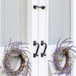 garden shed update with paint and door wreaths tall pin