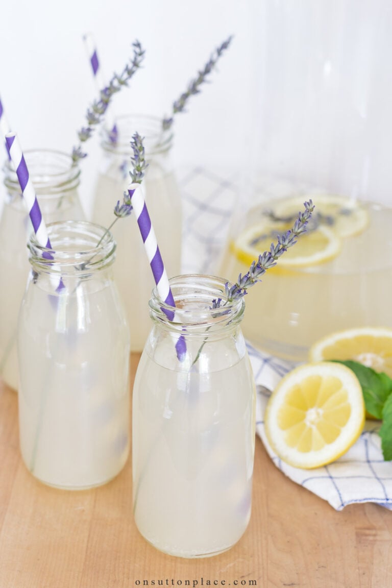 lavender lemonade in bottles with purple and white straws