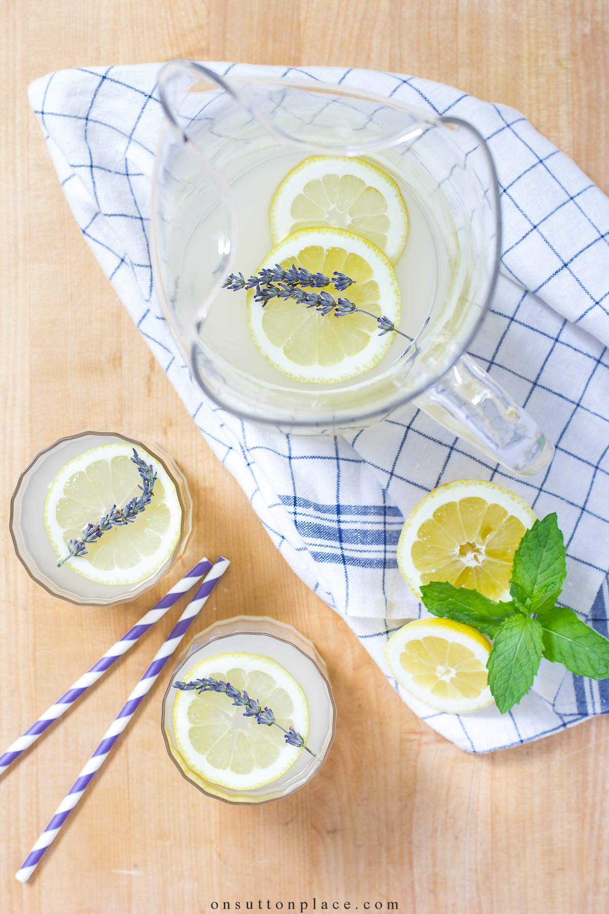 lavender lemonade in pitcher with lemon slices