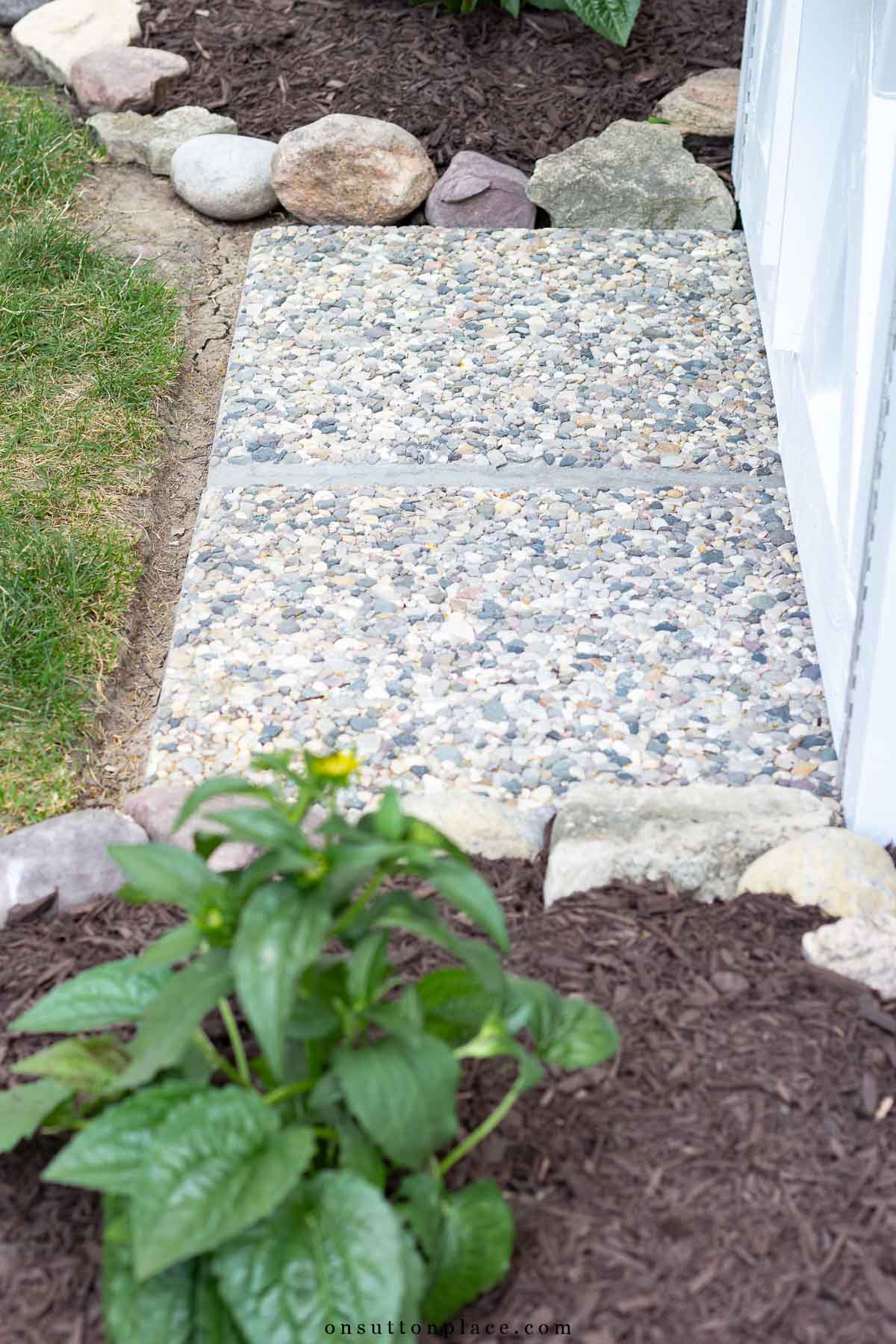 outdoor storage shed with pavers in front