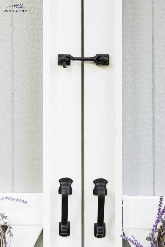 shed doors with new black hardware
