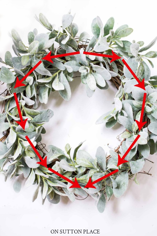 fall wreath idea greenery placement arrows on wreath