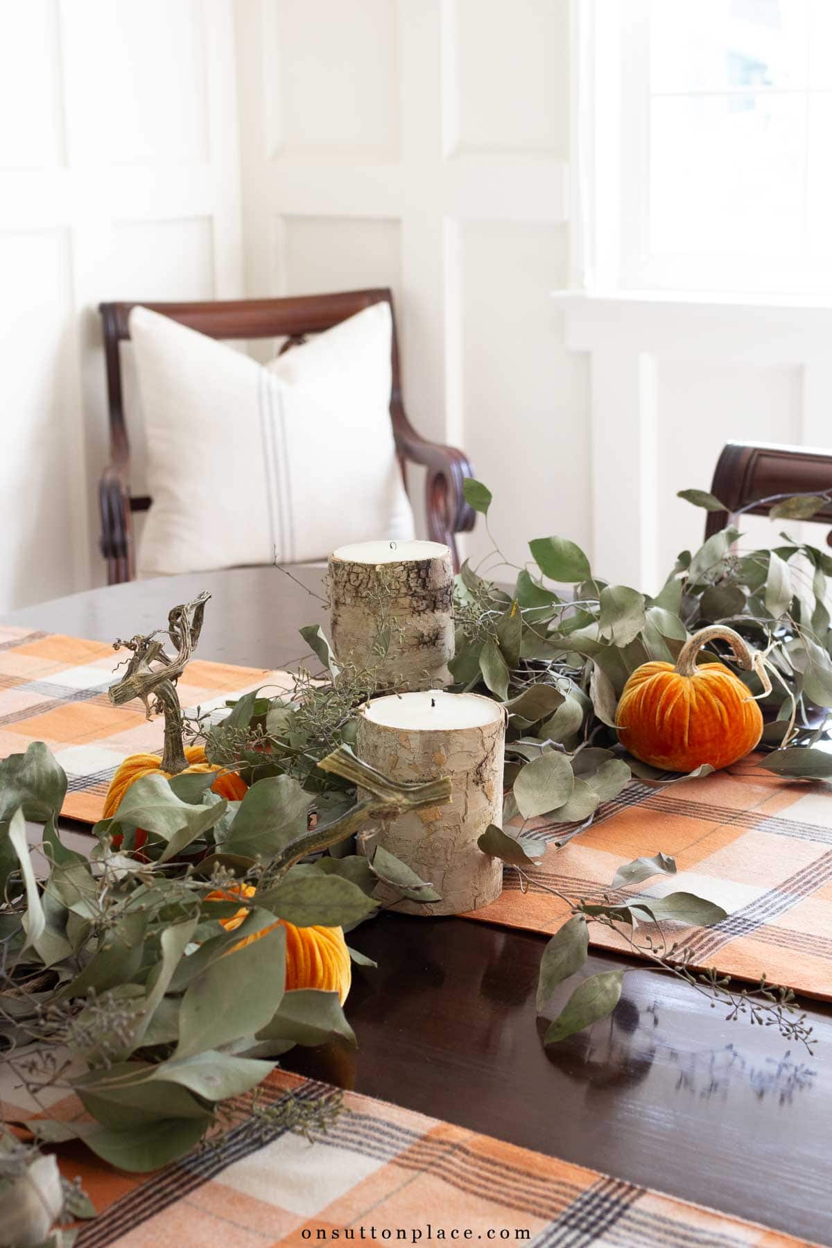 traditional dining room with fall centerpiece