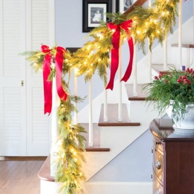 home for the holidays christmas garland on stairs fi