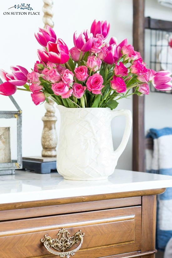 grocery store flowers arranged in pitcher