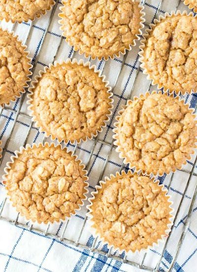 healthy applesauce muffins recipe cooling on rack fi