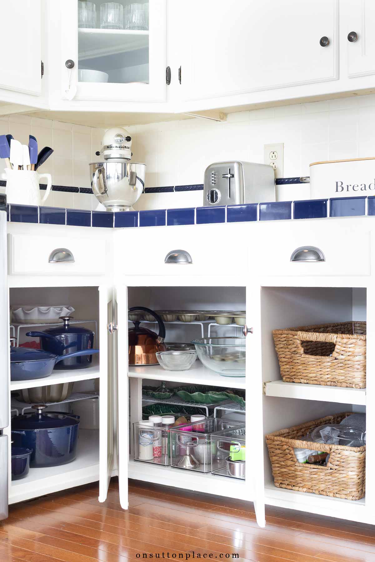 small kitchen organization ideas cookware in corner cabinet