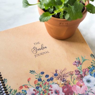spiral bound garden journal with potted pansy fi