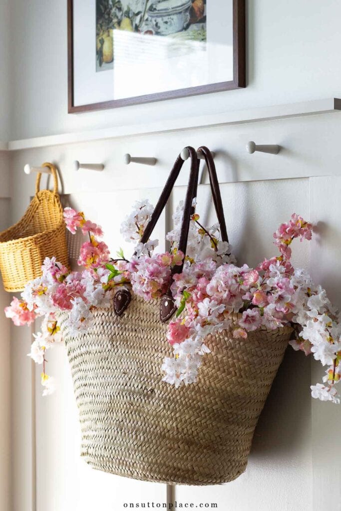 basket decor ideas market basket on hooks with cherry blossoms spring flowers