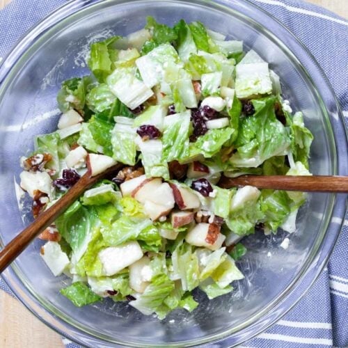 cranberry pear romaine salad recipe in pyrex bowl