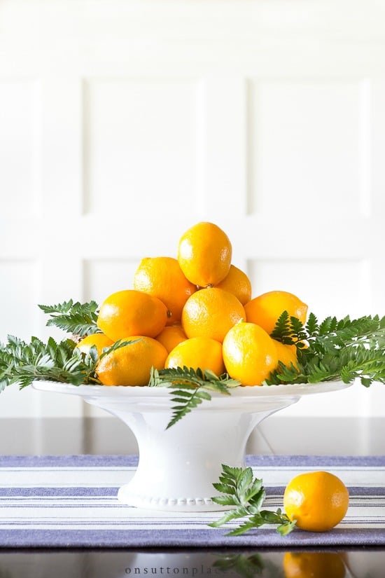 Make this fresh and beautiful meyer lemon centerpiece with items found at the grocery store, and in way under 20 minutes! #centerpiece #centerpieceidea #fruitcenterpiece #meyerlemon meyer lemon centerpiece
