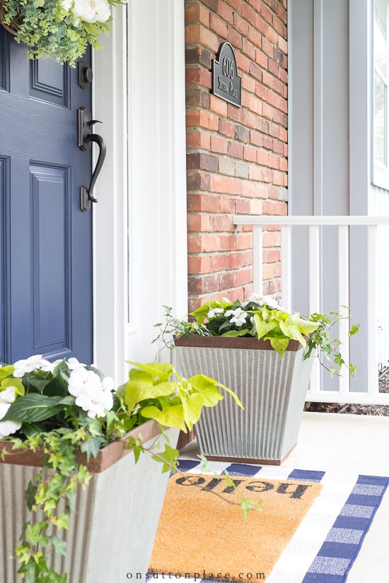 summer planters and layered hello doormats