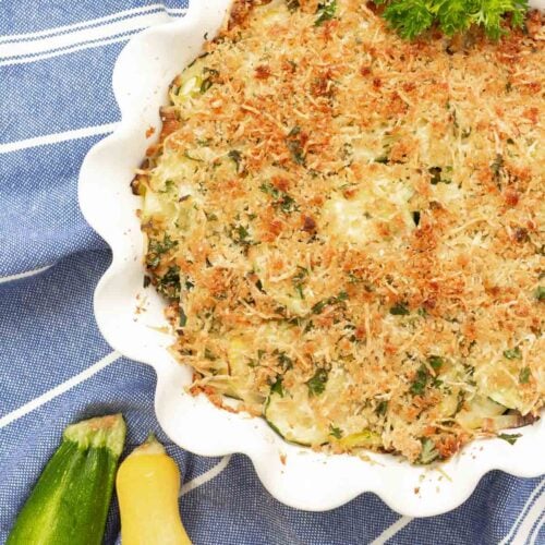baked zucchini gratin in ruffled pie plate