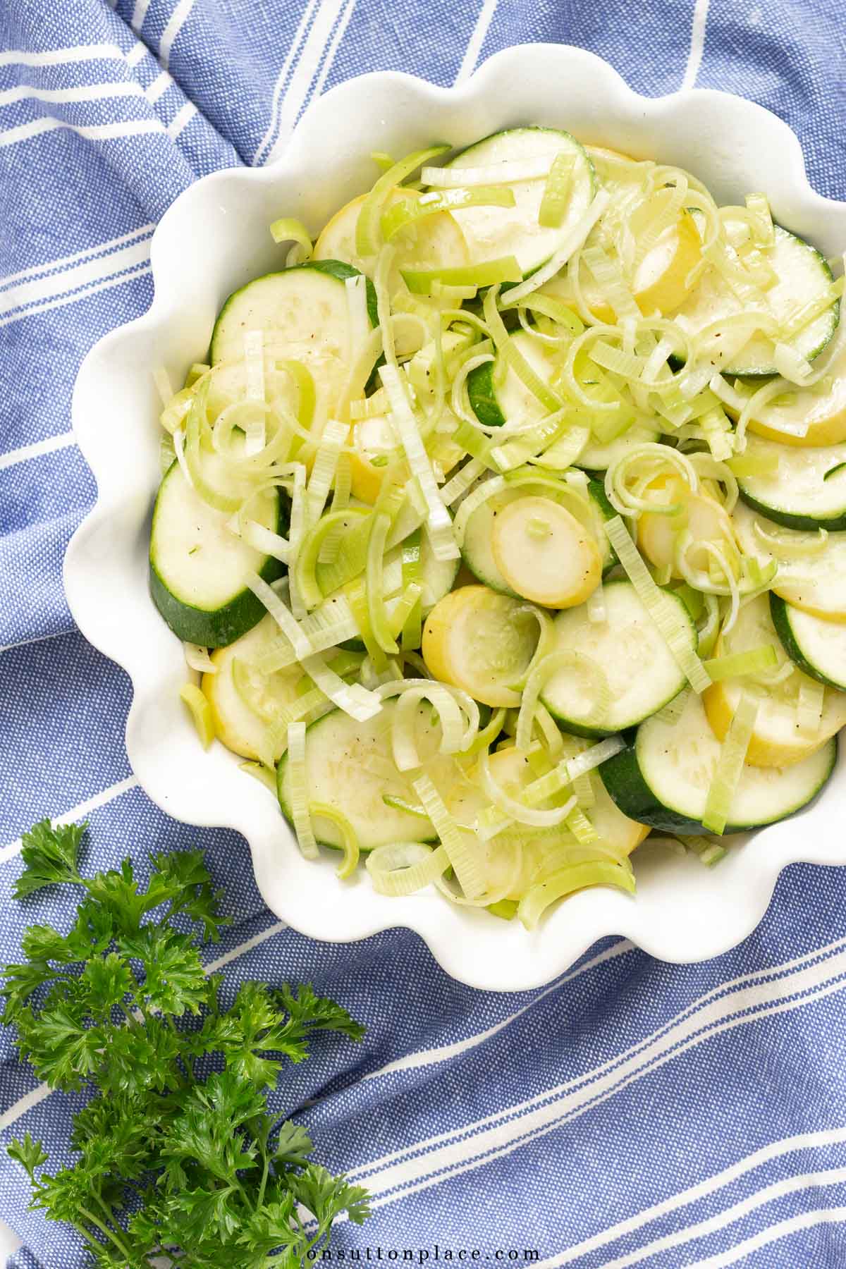 slices of yellow and green zucchini in pie dish