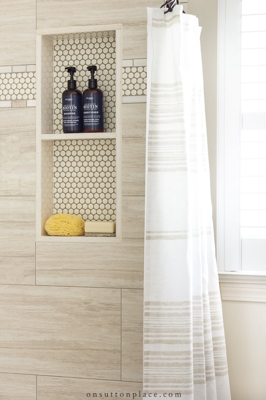 niche in tub beige tile