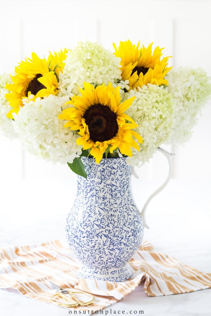 sunflowers and hydrangeas in pitcher 2022