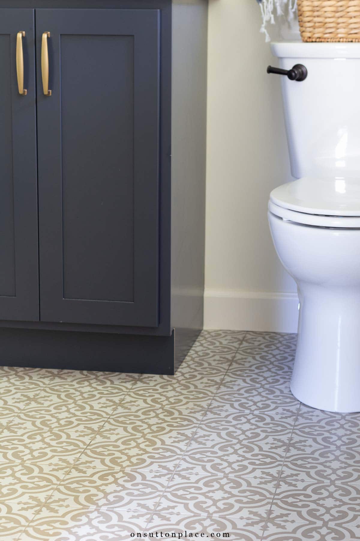 small primary bathroom remodel block print ceramic tile floor