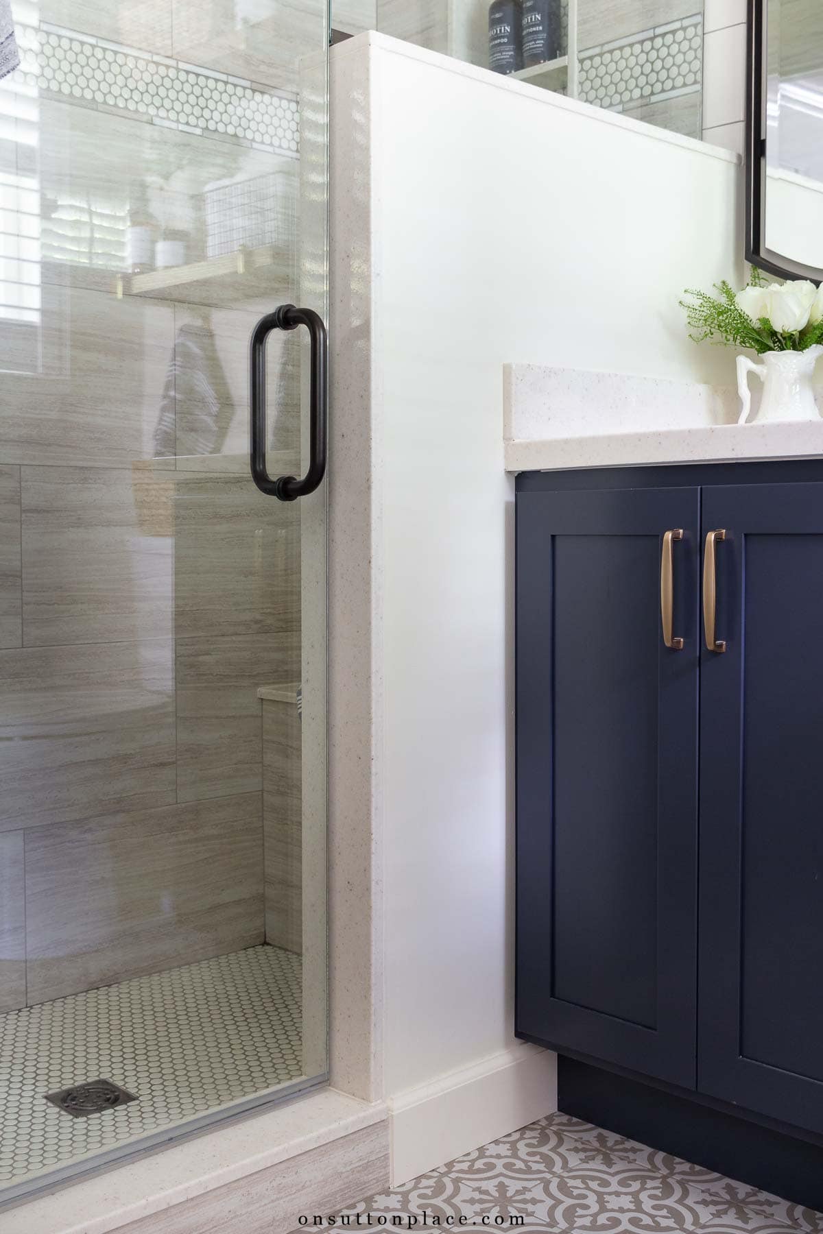 small primary bathroom remodel pony wall navy blue vanity