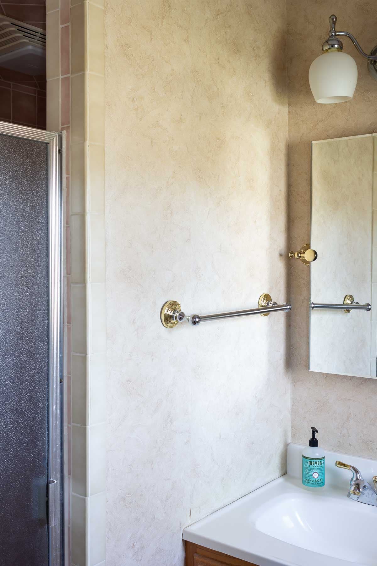 small primary bathroom remodel solid wall around shower before