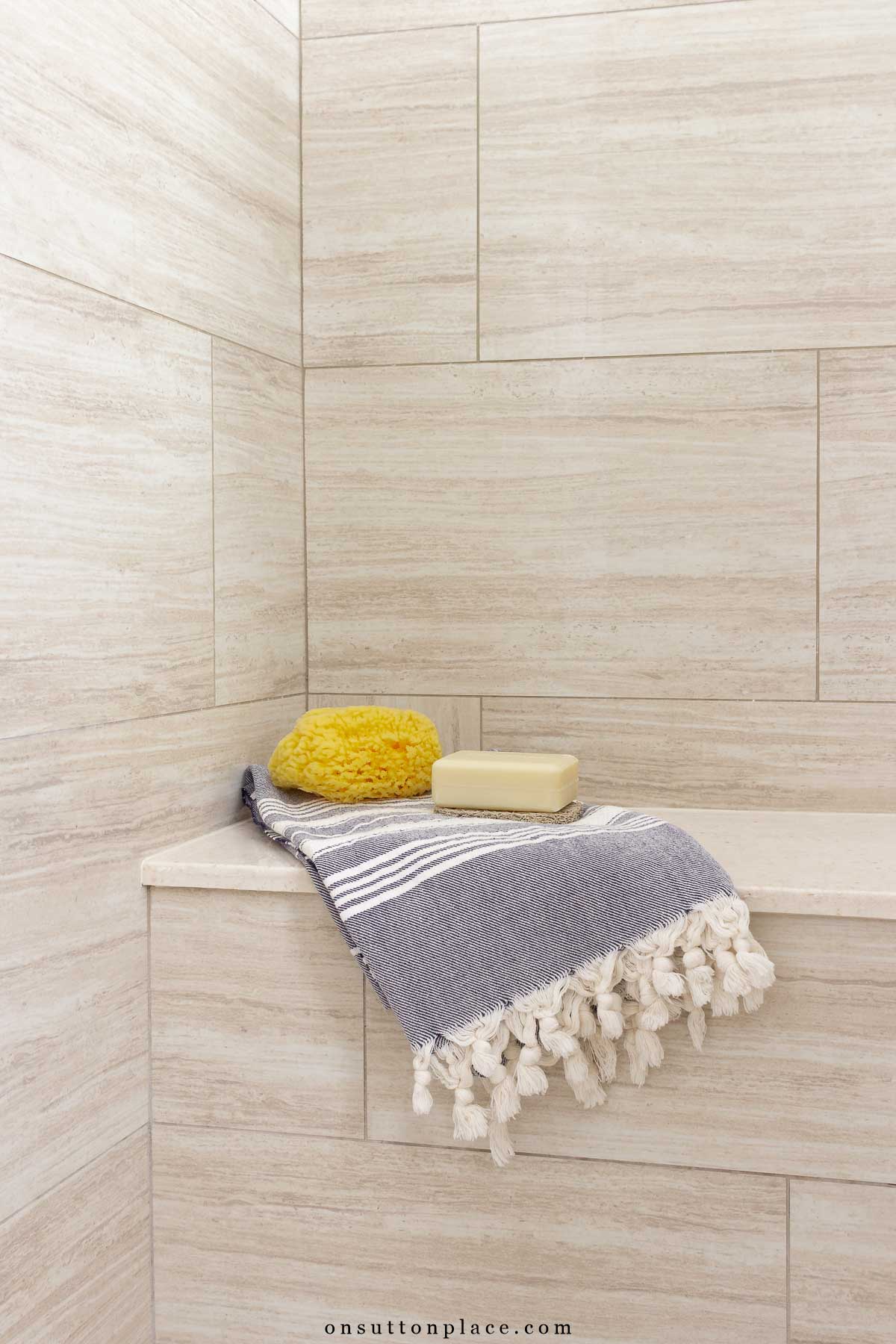 small primary bathroom remodel tile shower with seat