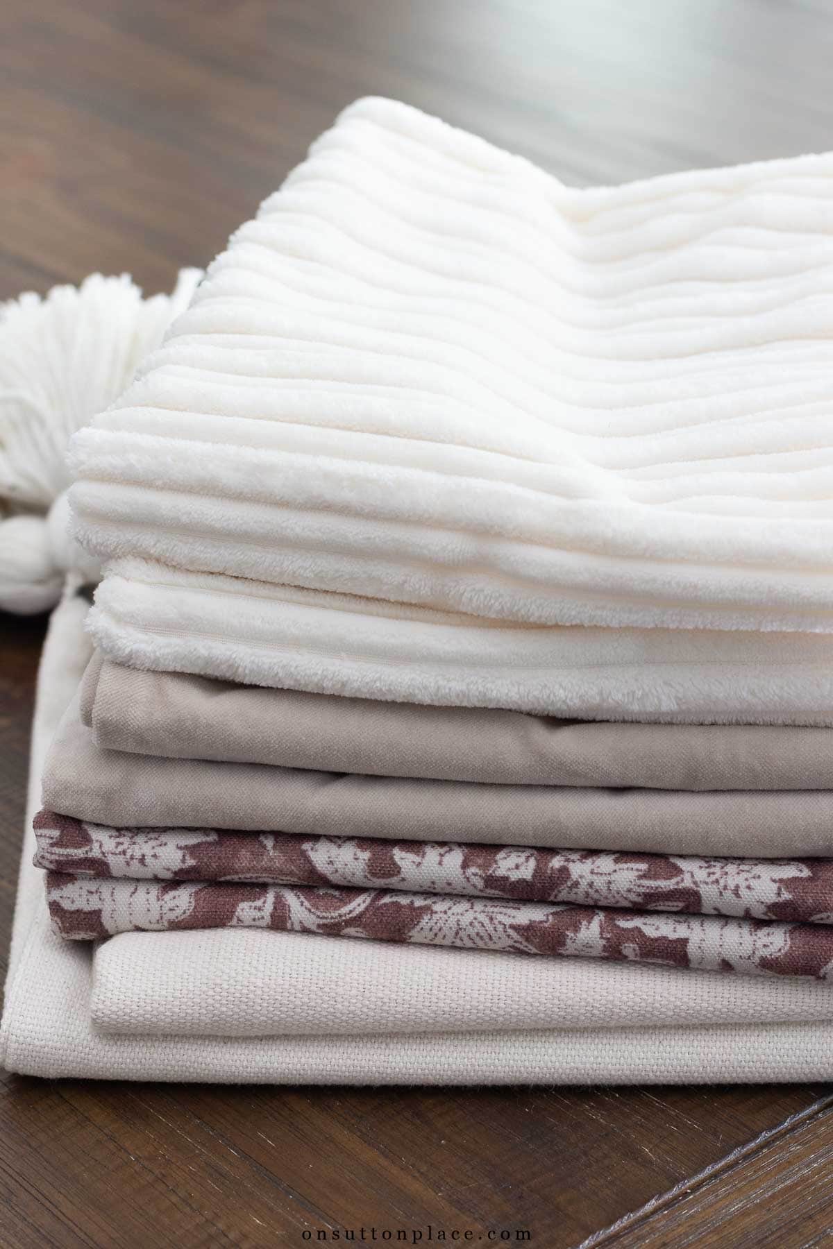 pile of folded neutral pillow covers