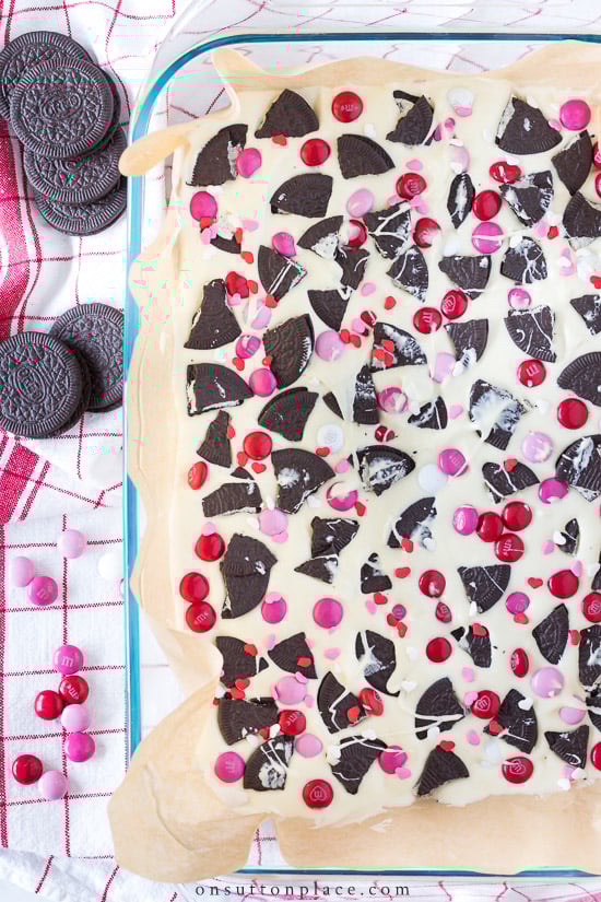 white chocolate bark recipe in parchment paper in baking dish