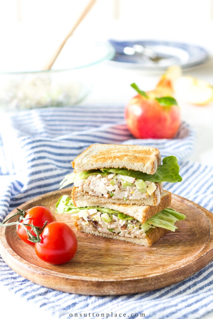 chicken salad with apples sandwich on cutting board