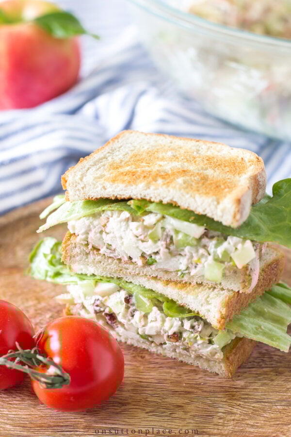 Make this chicken salad with apples for an easy lunch, or a casual dinner. Pile the chicken salad on thick toast for a filling & crunchy chicken salad sandwich. Stacked sandwiches filled with chicken salad with apples