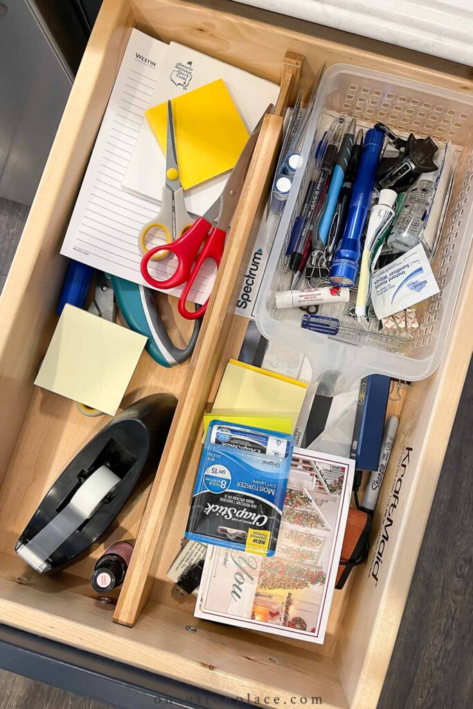 open unorganized junk drawer