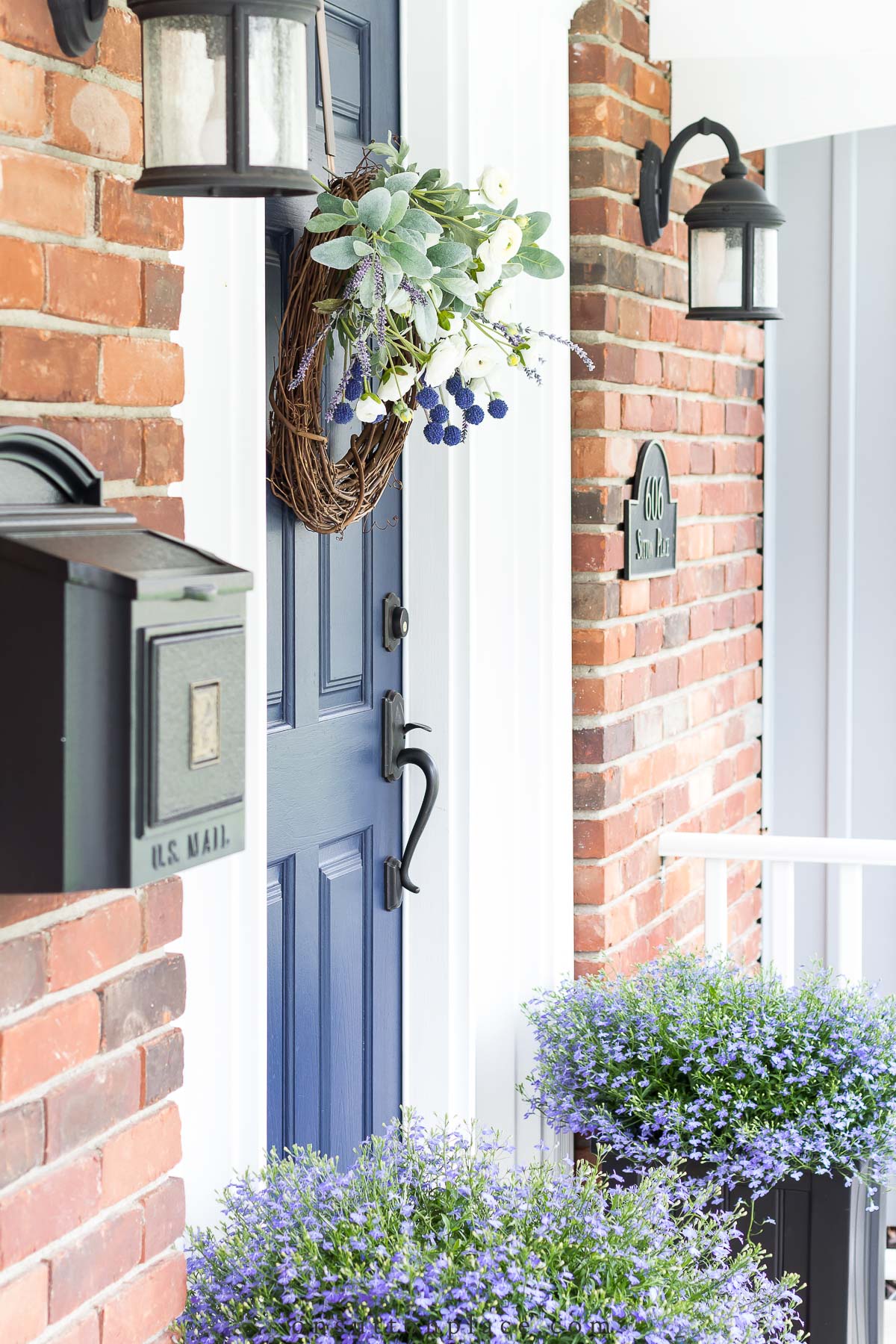 spring wreath on blue front door