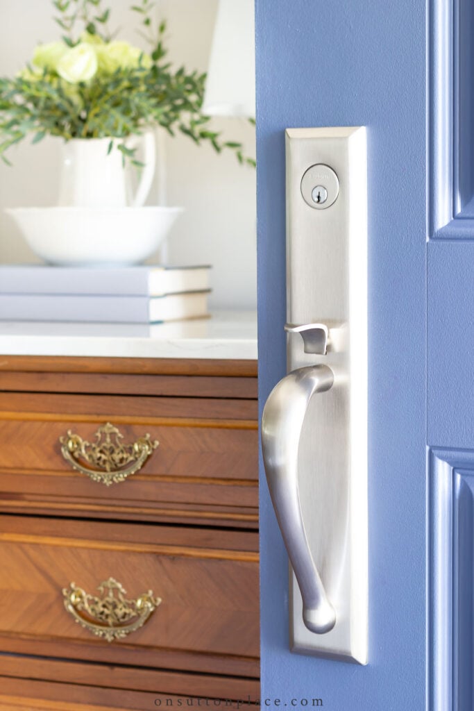 baldwin satin nickel handle on blue door