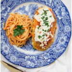 chicken parm recipe for two pin with text 2025
